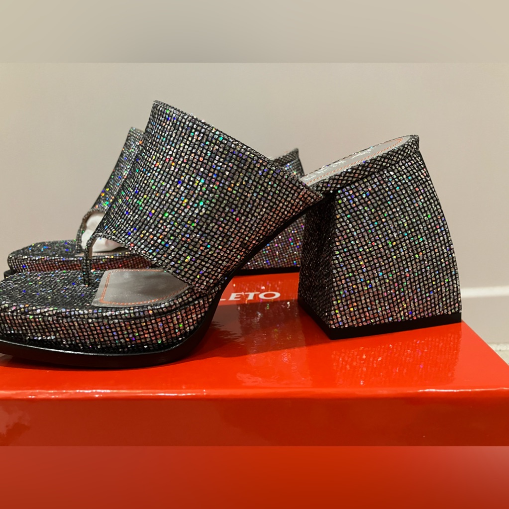 Nodaleto Thong Sandal Coarse Glitter. Size-9. Color-Silver. Never Worn